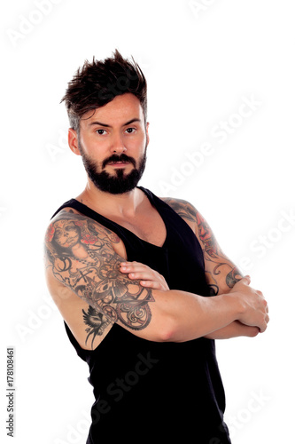 Thoughtful handsome man with tattoos