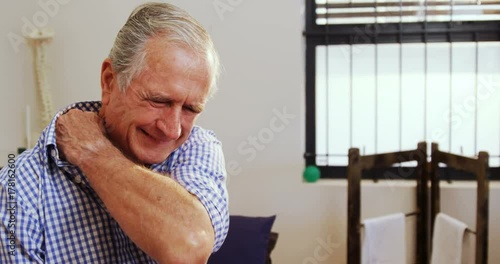 Senior man suffering from neck pain 