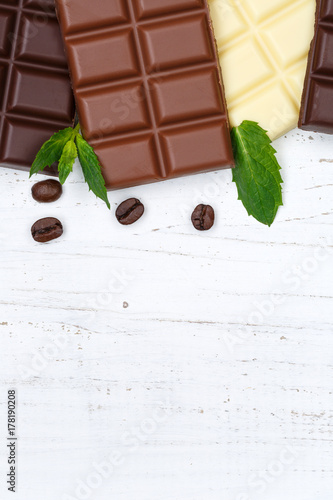 Fotoobraz na płótnie Chocolate Chalkboard Candy Food Copy Space Format pionowy Deska drewniana od góry