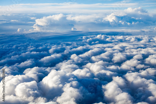 Fototapeta Beautiful, dramatic clouds and sky viewed from the plane