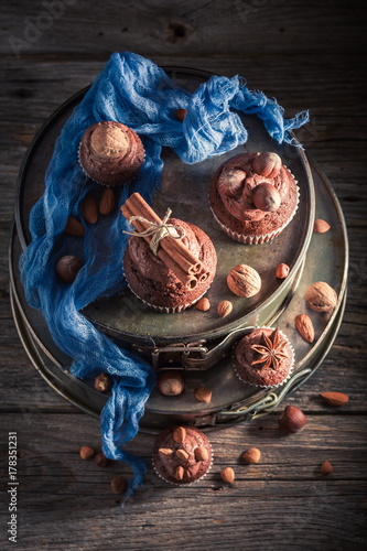 Homemade chocolate cupcake made of cream and nuts
