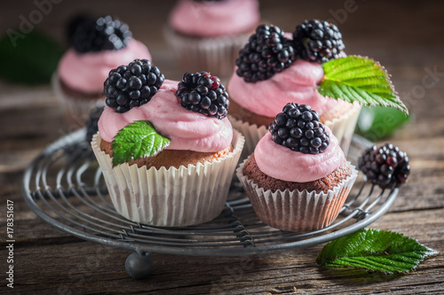 Delicious blackberry cupcake made of cream and fruits