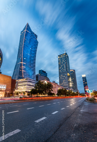 Warsaw, capital of Poland, modern skyscrapers on Emilii Plater street in the evening