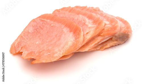smoked salmon segments isolated on white background cutout. Prepared fish fillet fibres.