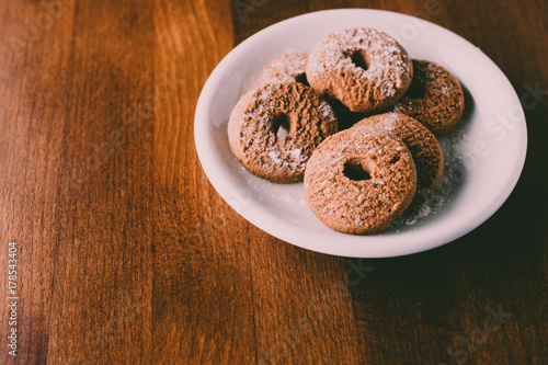 Pastry cookies on dark wood table