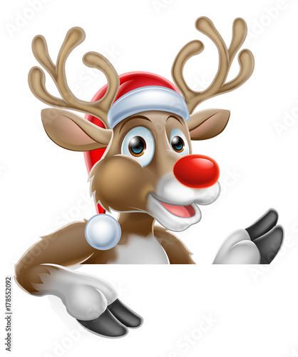 Reindeer in Santa Hat Pointing Down at Sign