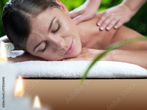 portrait of young beautiful woman in spa environment.  