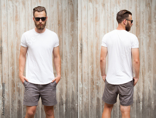 Front and back view of a hipster handsome male model with beard wearing white blank t-shirt with space for your logo or design in casual urban style