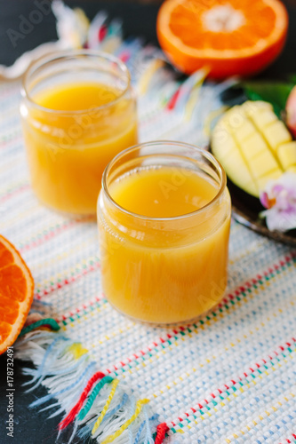 Mango and orange detox juice made from fresh fruits.