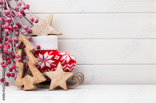 Christmas decor on the wooden white background.