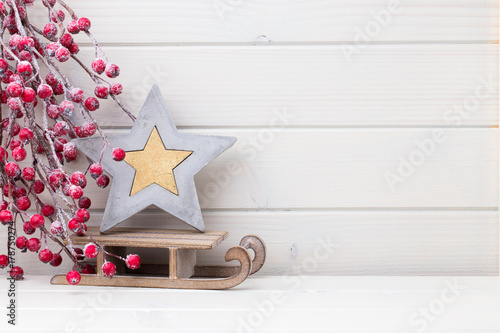 Christmas decor on the wooden white background.