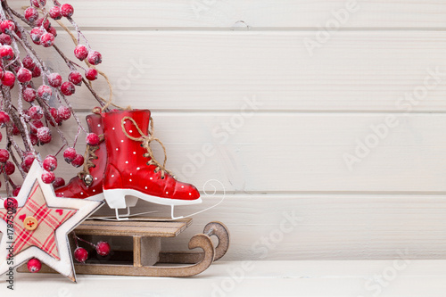 Christmas decor on the wooden white background.