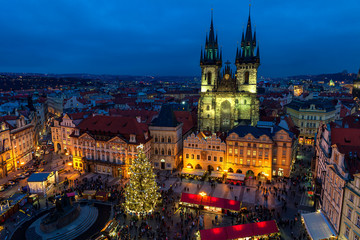 Old Town Square and Christmas market at evening in Prague.