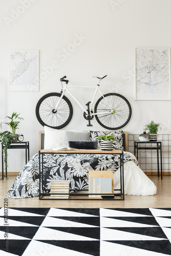 White bicycle in teenager's bedroom