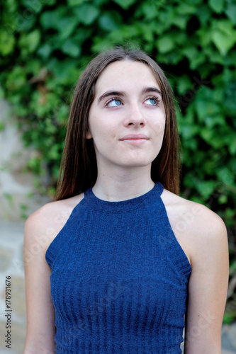 Cute teenager girl in a park