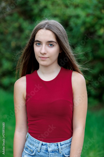 Cute teenager girl in a park