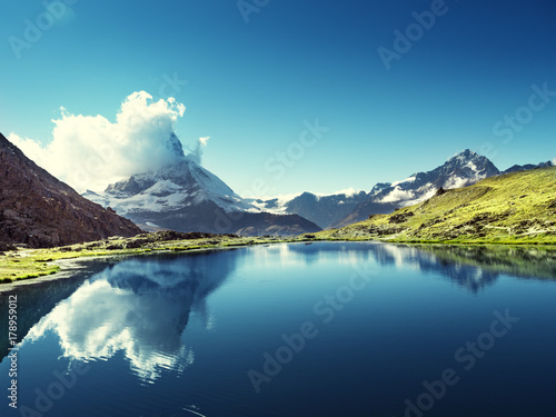 Reflection of Matterhorn in lake Riffelsee, Zermatt, Switzerland