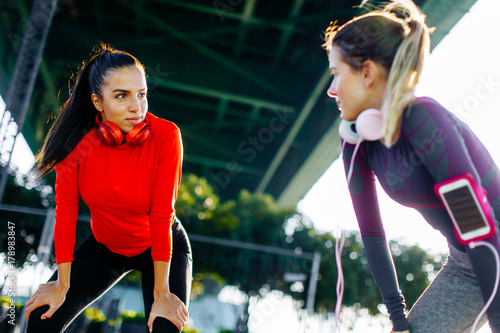 Young women exercising outside