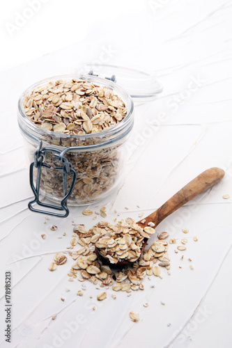 Healthy food concept with oats meal on white background.