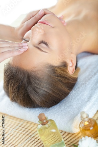 Portrait of a Woman Having a Head Massage