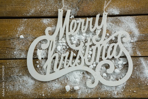 Merry Christmas text with artificial snow