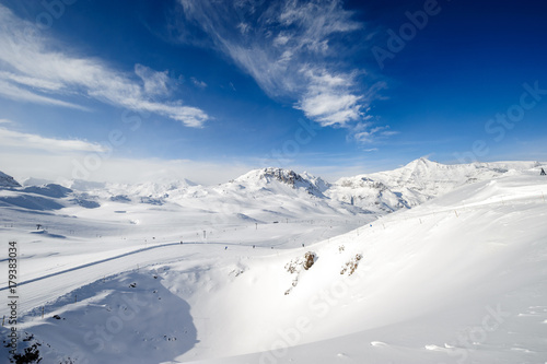 Alpine winter mountain landscape. French Alps with snow.