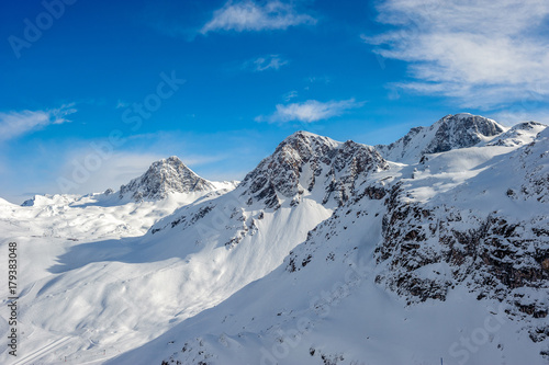 Alpine winter mountain landscape. French Alps with snow.