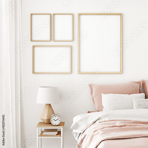 Interior poster mock up with four frames on the wall in home bedroom interior. 3D rendering.