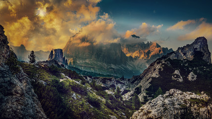 Great sunset view of the top Tofana di Rozes and Cinque Torri range in  Dolomites, South Tyrol. Location Cortina d'Ampezzo, Italy, Europe. Dramatical cloudy scene. Beauty of mountains world.