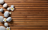 zen pebbles and spa flowers set on hammam wooden board