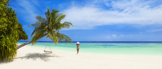 Touristen am Maledivenstrand