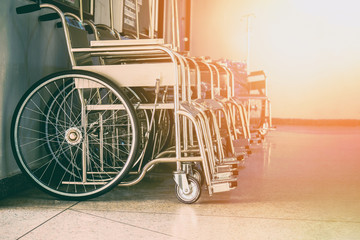 Row Wheelchairs in the hospital ,Wheelchairs waiting for patient services.