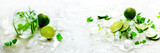 Homemade lime lemonade with cucumber, rosemary and ice, white background. Cold beverage, detox water. Copyspace. Banner