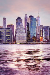 Manhattan skyline at sunset, color toned picture, New York City, USA.