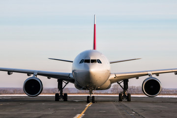 Wide-bodied passenger aircraft on the main taxiway