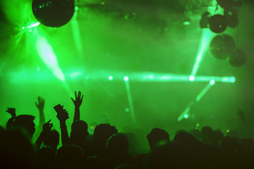 dj night club party rave with crowd in music festive