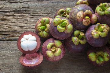 Mangosteen fruit on wood table with top view