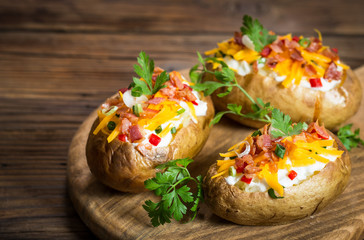 Baked potatoes with cheese and bacon