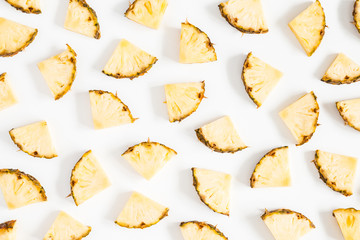 Pineapples pattern on white background. Summer concept. Flat lay, top view