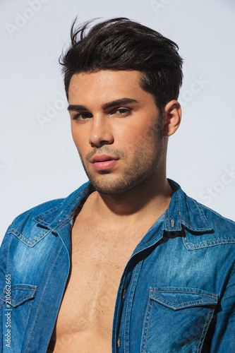 Фото: poortrait of sensual casual man with undone denishm shirt poortrait of sensual casual man with undone denishm shirt