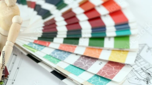 Видео: wooden man, a palette of colors designs for interior works, samples of plastics, PVC, for furnishing and architectural drawings houses wooden man, a palette of colors designs for interior works, samples of plastics, PVC, for furnishing and architectural drawings houses