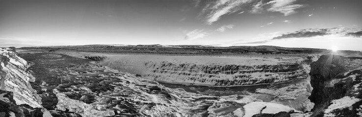 Panoramic view of small icy river