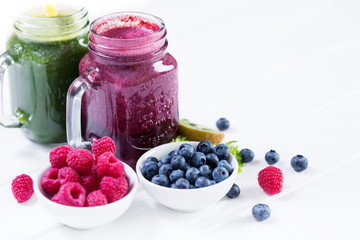 Smoothie vegetables and berry bottles