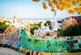 Gaudi bench and cityscape of Barcelona from park Guell, famous view of Barcelona, Spain at fall