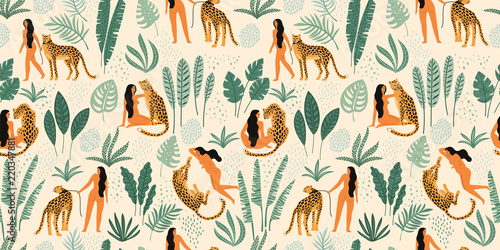 Vector seamless pattern with women, leopards and tropical leaves. © Nadezda Grapes