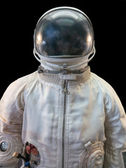 Soviet cosmonaut or astronaut or spaceman suit and helmet on black background