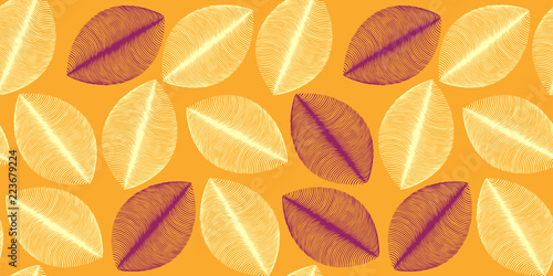 leaves silhouettes seamless pattern in orange and brown shades © L.Dep