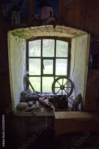 View from inside through an old window in a windmill © Ralf