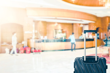 Abstract Blur hotel lobby with receptionist and luggage bag for background
