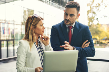 Business people are discussing about project